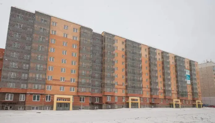 ЖК Норма фасад дома с подъездами в зимний период